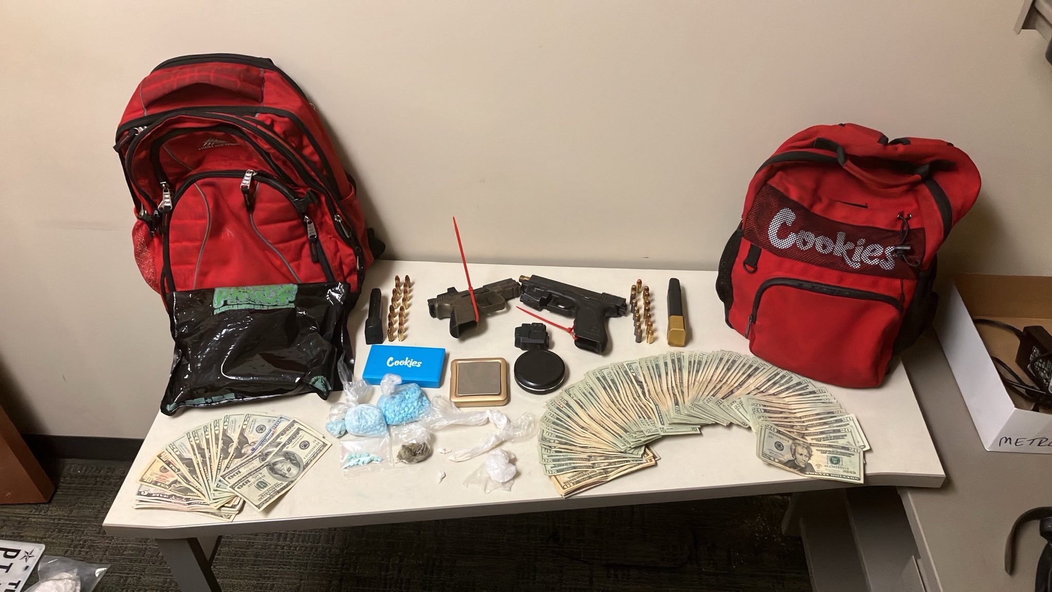 Two Men Free on Bond Rearrested Wednesday Night; Fully Automatic